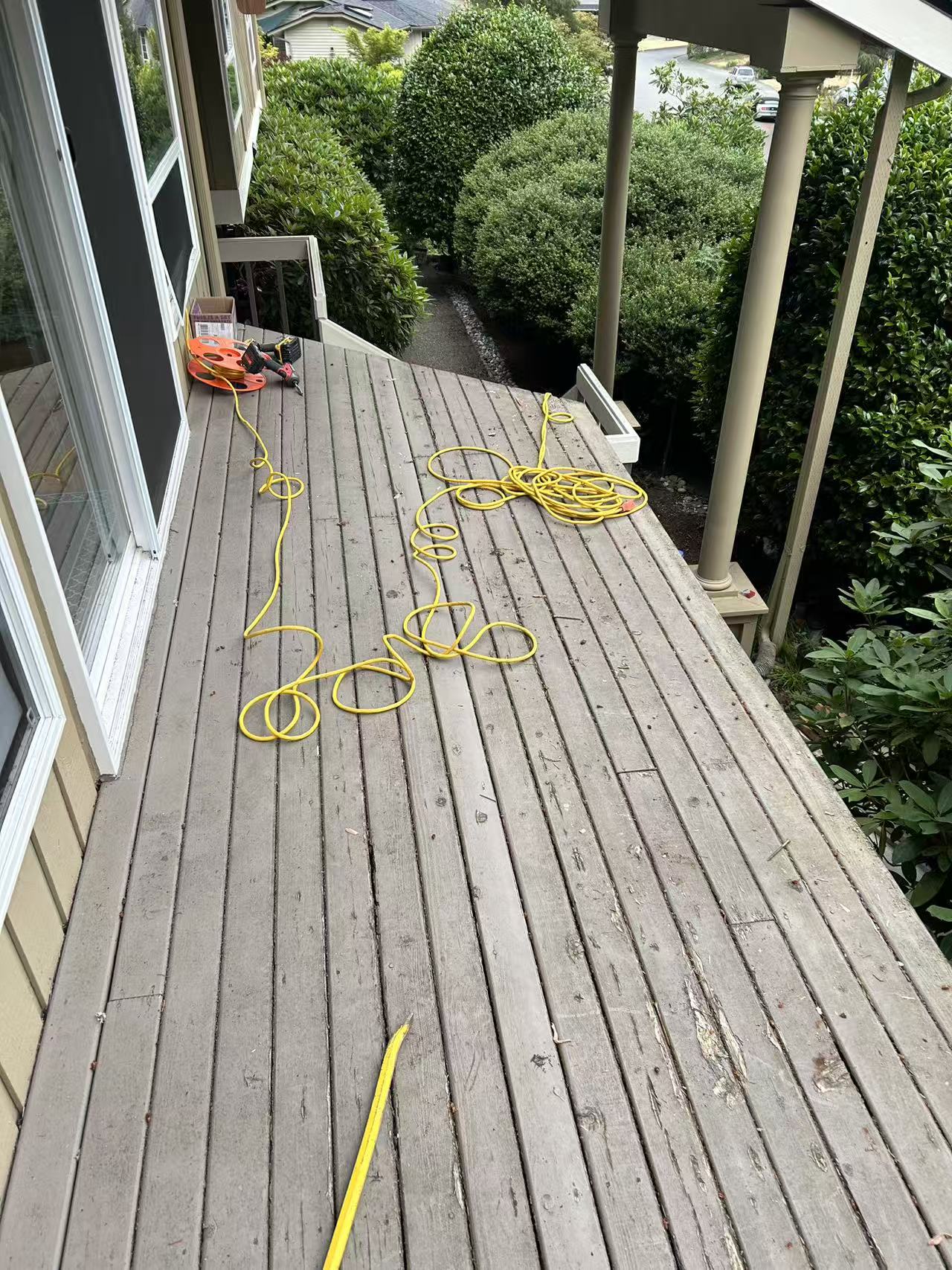 Bothell deck stage 1 — original deck with faded boards