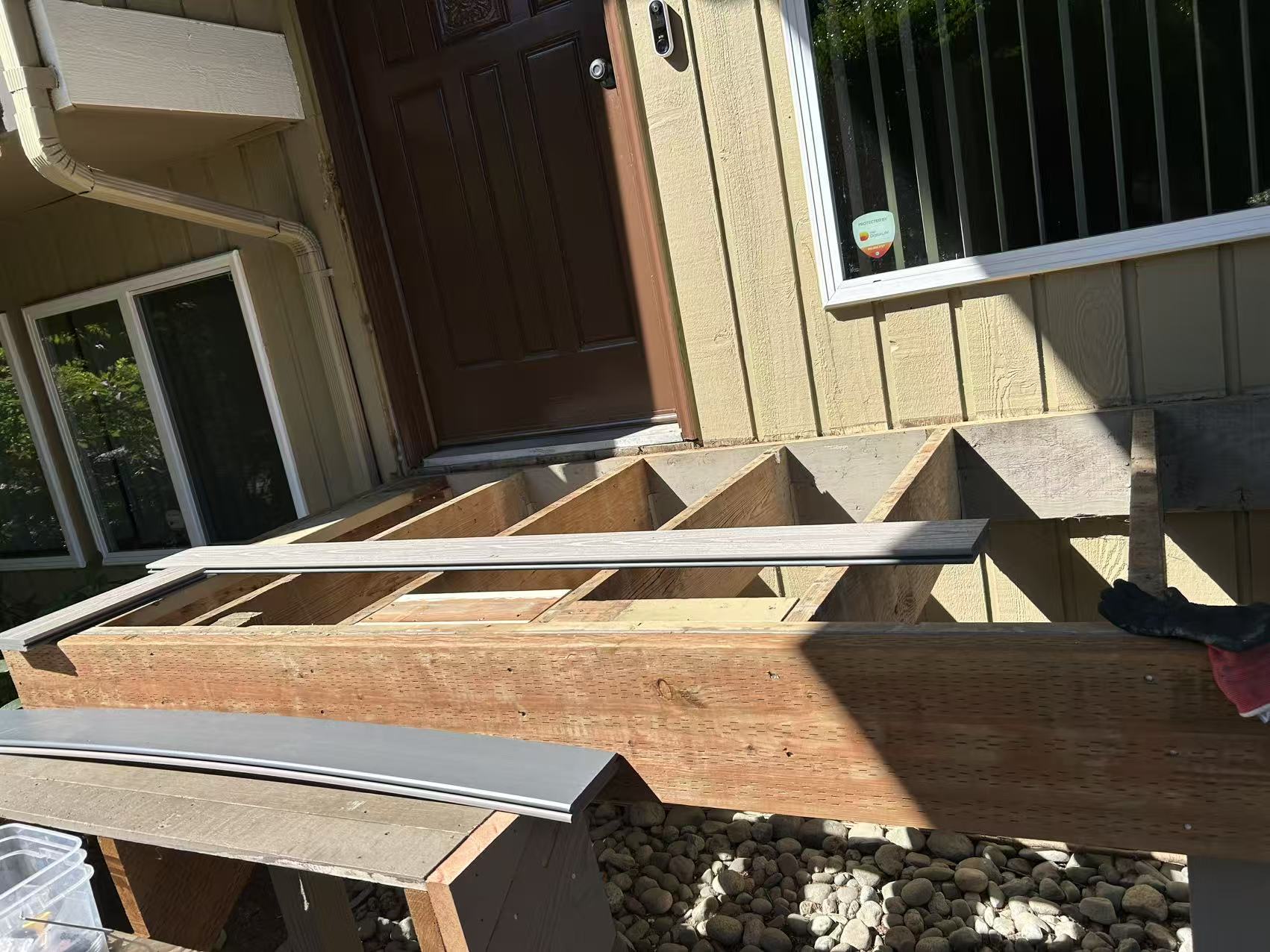 Bothell deck stage 6 — finished deck in daylight with white rails